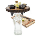 Wooden drink tray with shot glasses, lime wedges, and a bottle on a white background
