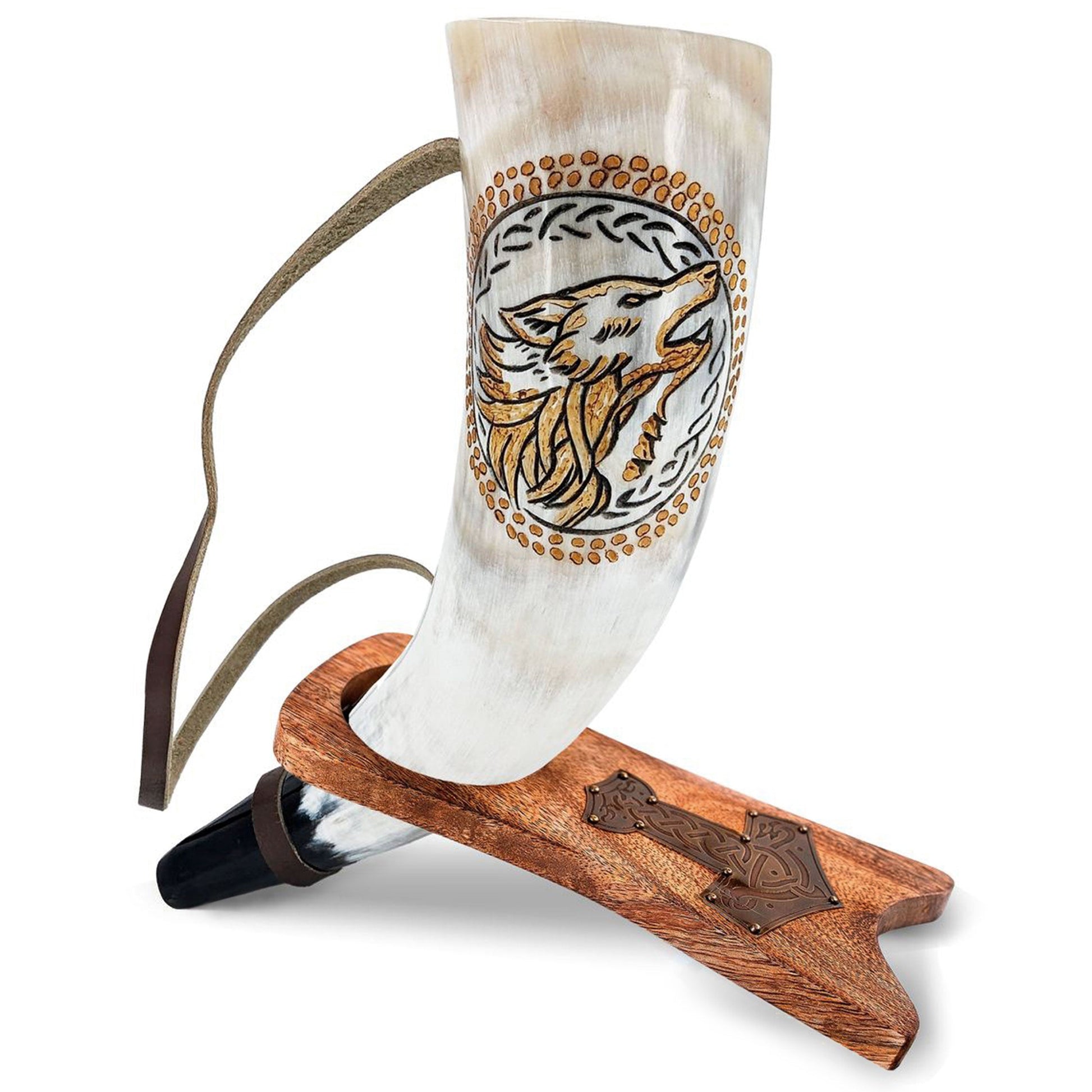 Decorative horn with a wolf design on a wooden stand against a white background