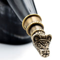 Decorative pen cap with intricate design on a white background