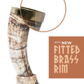Viking-style drinking horn with a new fitted brass rim on a white background