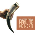 Hand holding a genuine ox horn with text 'Crafted from Genuine Ox Horn' on a white background