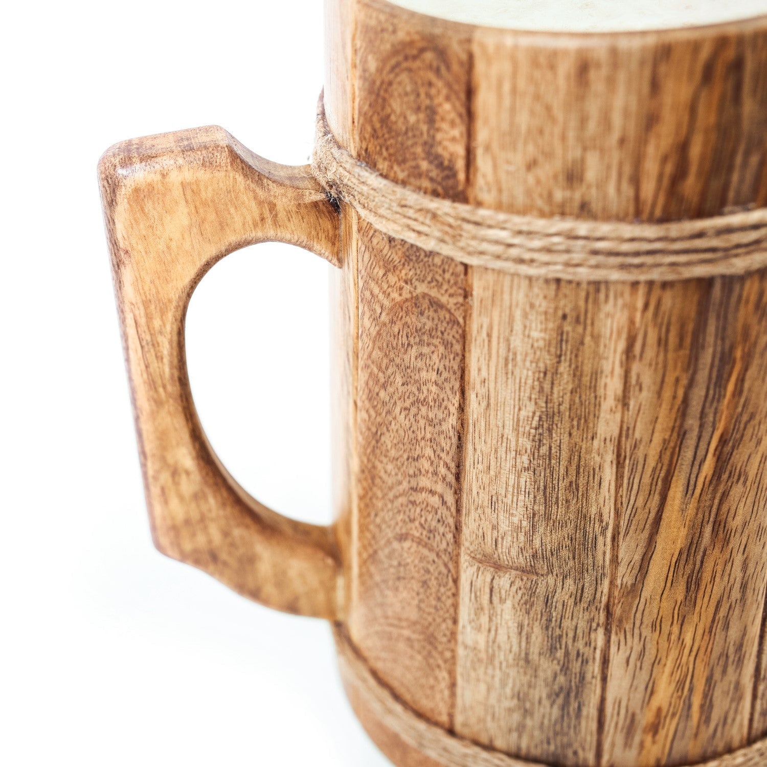 Wooden mug with a handle on a white background