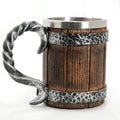 Wooden mug with metal handle and band on a white background